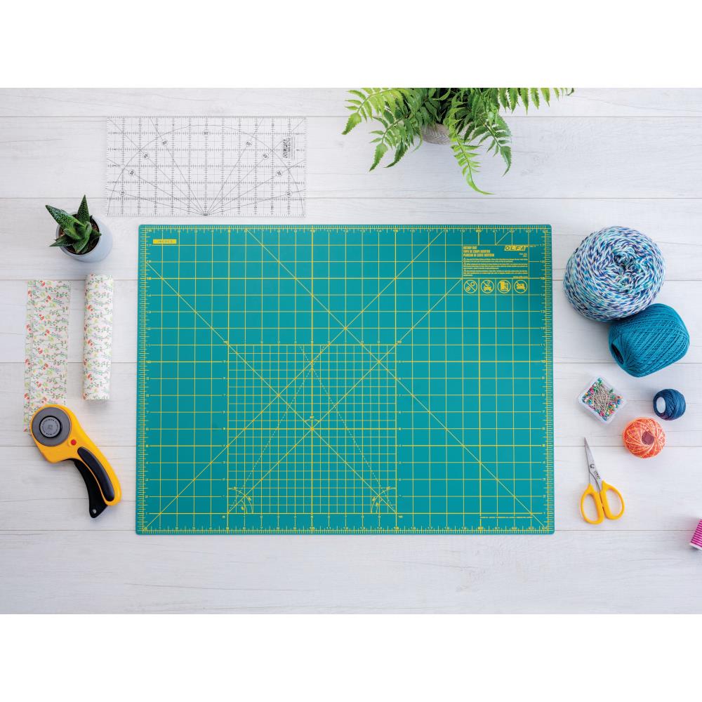 OLFA 60mm Ergonomic Rotary Cutter with Self Retracting Blade Made in Japan